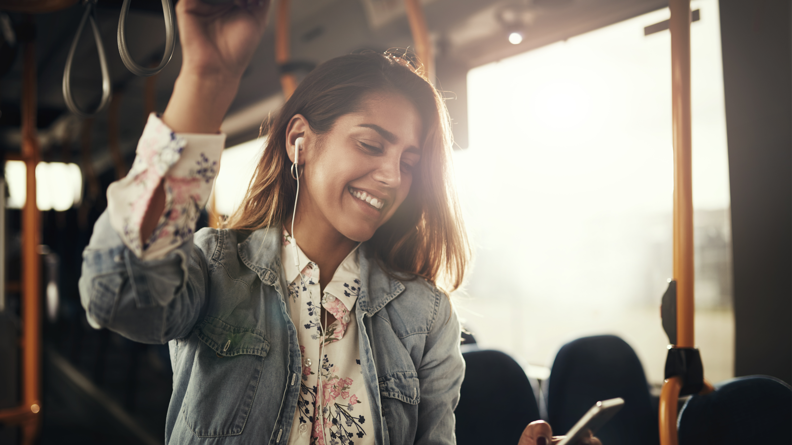 Smiling woman in the bus